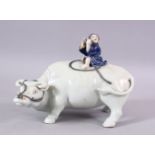 A JAPANESE MEIJI PERIOD POSSIBLY HIRADO PORCELAIN FIGURE OF AN OXEN AN ATTENDANT, the attendant upon