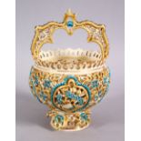 A ISLAMIC ZSLONAY OPENWORK PORCELAIN FORMED CASKET, with turquoise and gilded decoration, 18cm x