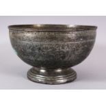 AN ISLAMIC PERSIAN SAFAVID OR LATER BRONZE BOWL, with carved hunting scenes, and flora, 12cm high