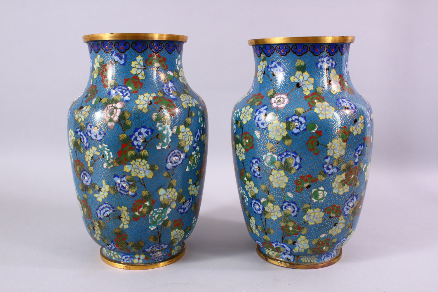 A LARGE PAIR OF 19TH / 20TH CENTURY CHINESE CLOISONNE VASES, each decorate with an array of flora - Image 3 of 6