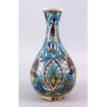 AN EARLY PERSIAN POTTERY BOTTLE VASE, with formal floral motif, 30cm, (AF)