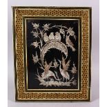 AN ISLAMIC PERSIAN MICRO MOASIC VIZAGAPATAM PHOTO FRAME - with a white metal display of birds