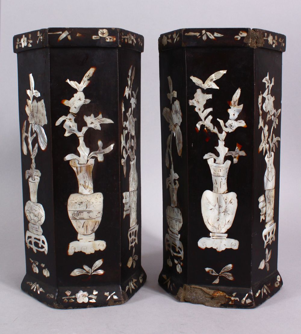 A PAIR OF 19TH CENTURY CHINESE HEXAGONAL CARVED WOODEN INLAID MOTHER OF PEARL VASES, inlaid with