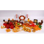 A VERY LARGE COLLECTION OF BAKELITE / CHERRY AMBER ITEMS, consisting of bead necklaces,