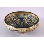 AN EARLY PERSIAN SULTAN ABBAD POTTERY BOWL, with floral decoration, 16cm.