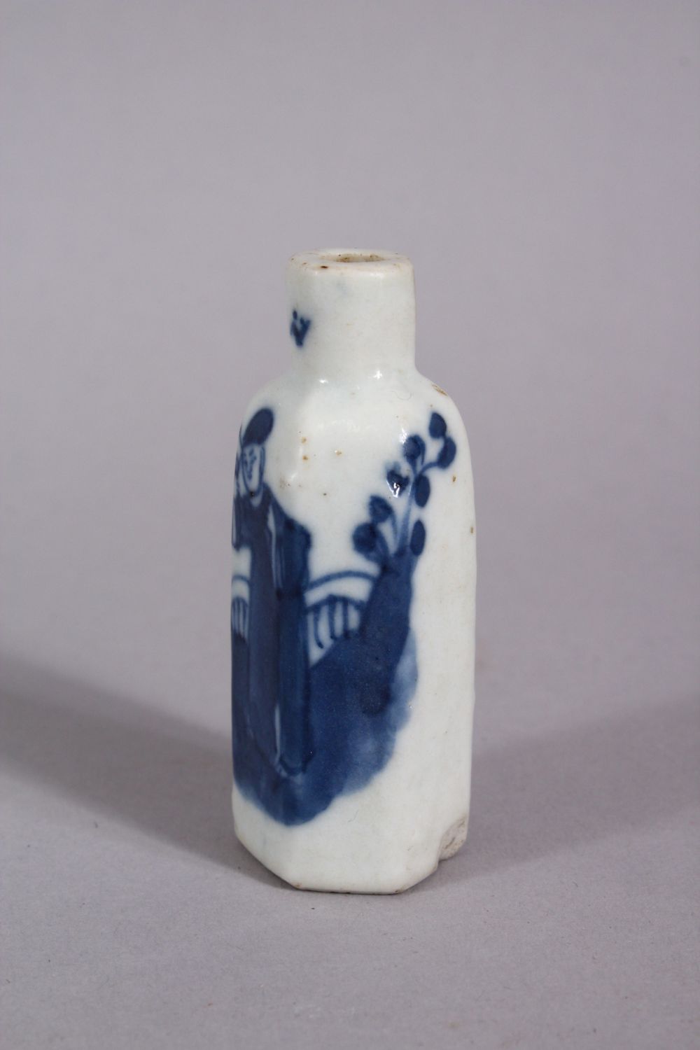 A CHINESE BLUE & WHITE PORCELAIN HEXAONAL FORM SNUFF BOTTLE, decorated with a figure in a garden, - Image 3 of 4