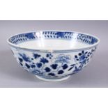 TWO 18TH / 19TH CENTURY CHINESE BLUE & WHITE PORCELAIN BOWLS, the larger with decoration depicting