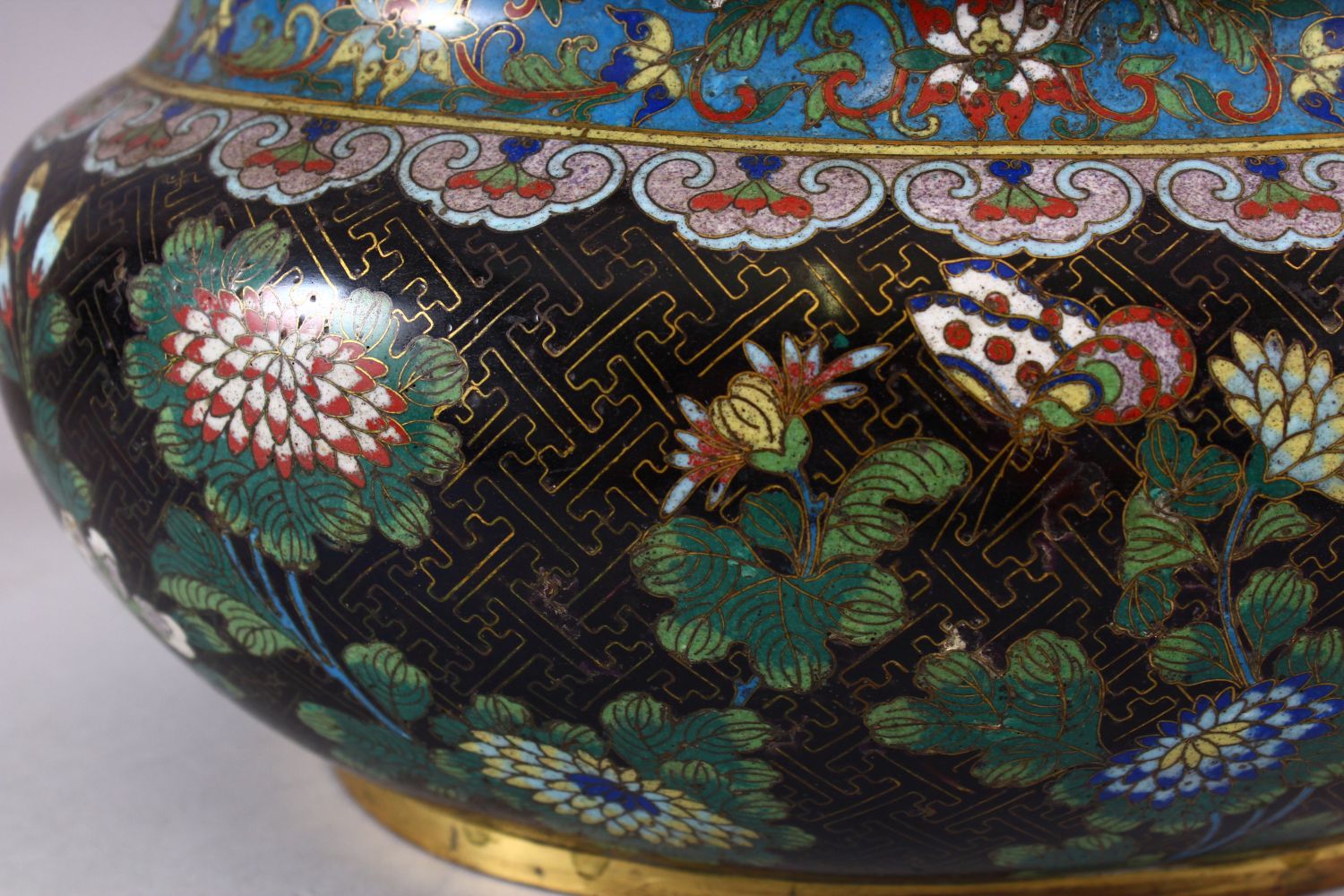 A 19TH / 20TH CENTURY CHINESE CLOISONNE TRIO, consisting of a pair of vases and a planter, decorated - Image 3 of 11