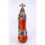 A 19TH CENTURY TURKMAN SILVER MOUNTED POWDER FLASK, inset with semi precious stones, 15cm long