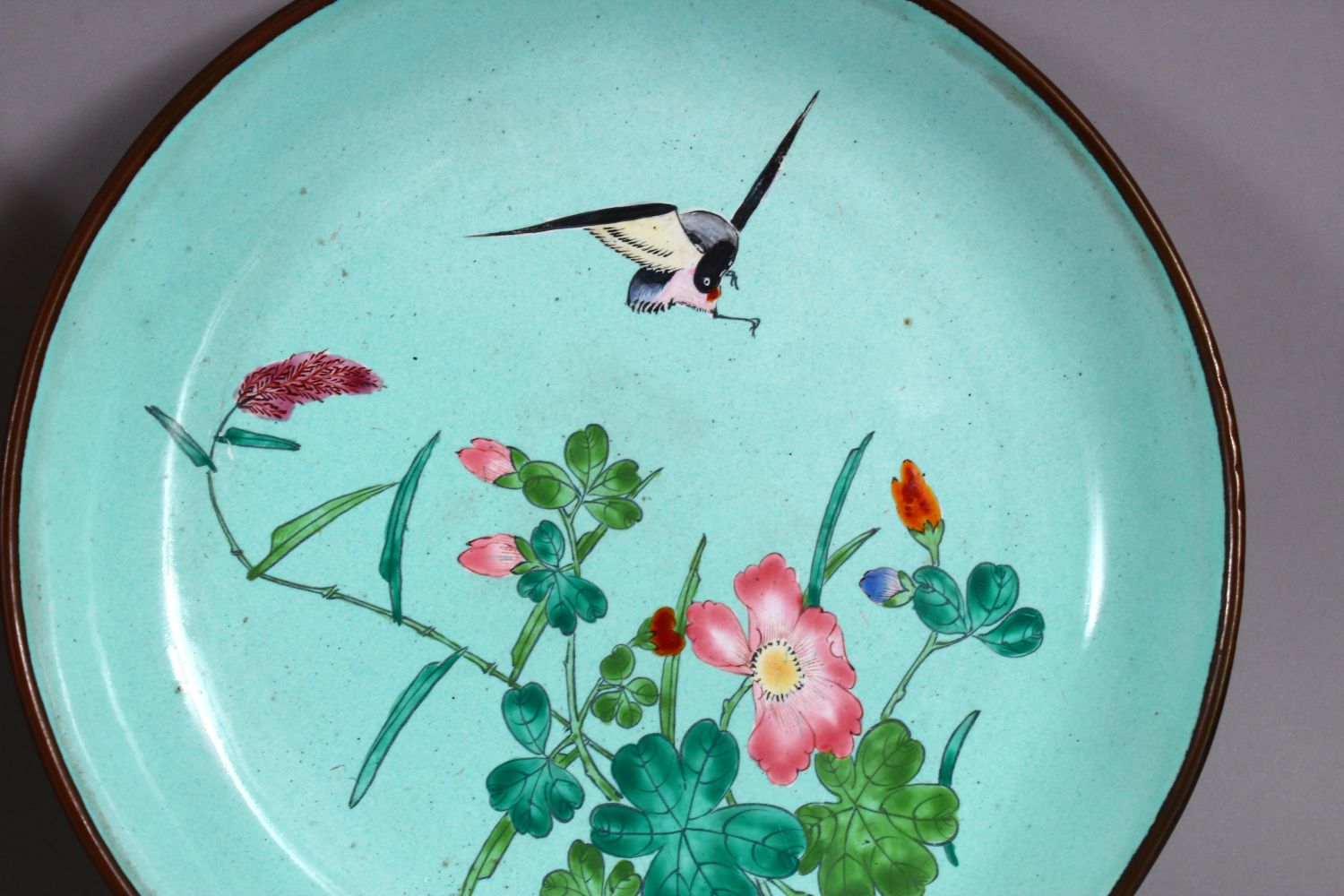 A PAIR OF 19TH / 20TH CENTURY CHINESE ENAMEL SAUCER DISHES, each decorated witih scenes of a bird in - Image 3 of 4