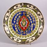 A JAPANESE MEIJI PERIOD SATSUMA CERAMIC PLATE FOR THE ISLAMIC MARKET, decorated with iznik floral