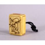 A JAPANESE MEIJI PERIOD CARVED NETSUKE - FUKUROKUJU - a rectangular box formed netsuke with carved