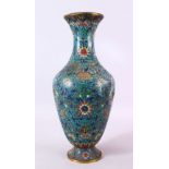 A CHINESE 19TH CENTURY CLOISONNE VASE, decorated with a blue ground and formal scrolling lotus, with