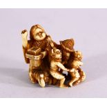 A JAPANESE MEIJI PERIOD CARVED IVORY NETSUKE - LADY & CHILDREN WITH ONI'S - the lady and children