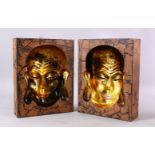 A PAIR OF GILDED CHINESE MASK MOULDS OF BUDDHA, 31CM X 24CM