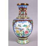 A GOOD 20TH CENTURY CHINESE ENAMEL VASE - ith a cafe au lait ground and panels of birds amongst