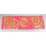 A FINE JAPANESE SILK EMBROIDERED FUKURO OBI TIE - upon a pink ground with silver and gold coloured