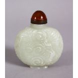 A CHINESE CARVED JADE SNUFF BOTTLE, carved with floral swirl decoration,with a hard stone stopper,
