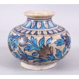 AN GOOD TURKISH POTTERY GLOBULAR VASE, decorated with formal floral decoration, 12cm high.