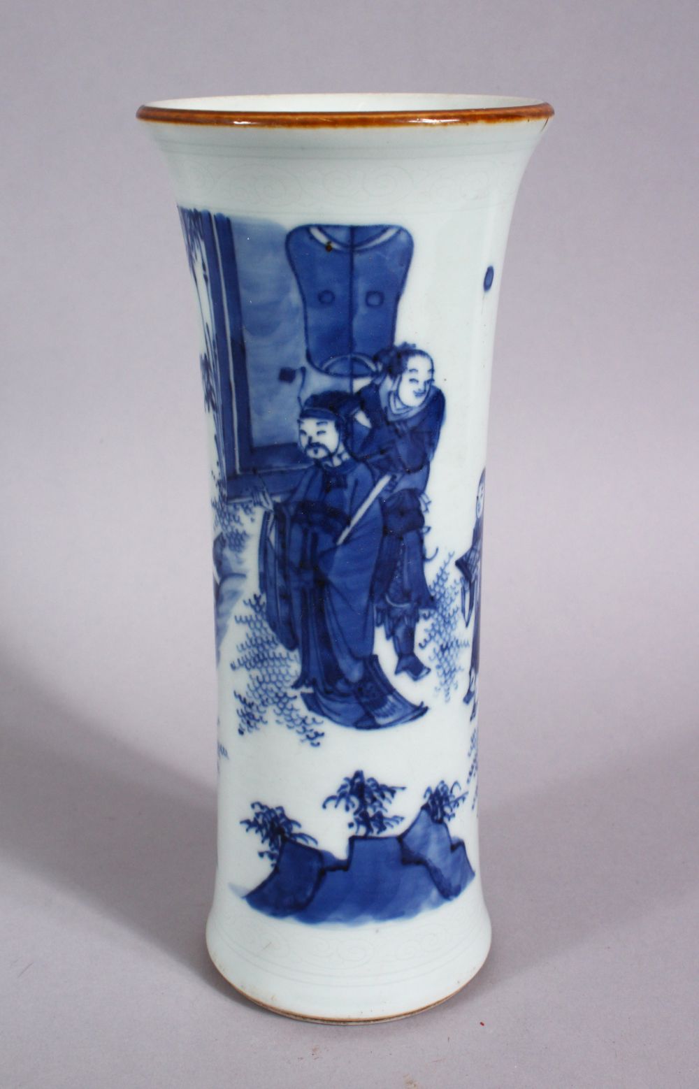 A CHINESE BLUE & WHITE PORCELAIN SLEEVE VASE, decorate with scenes of figures in landscape settings,