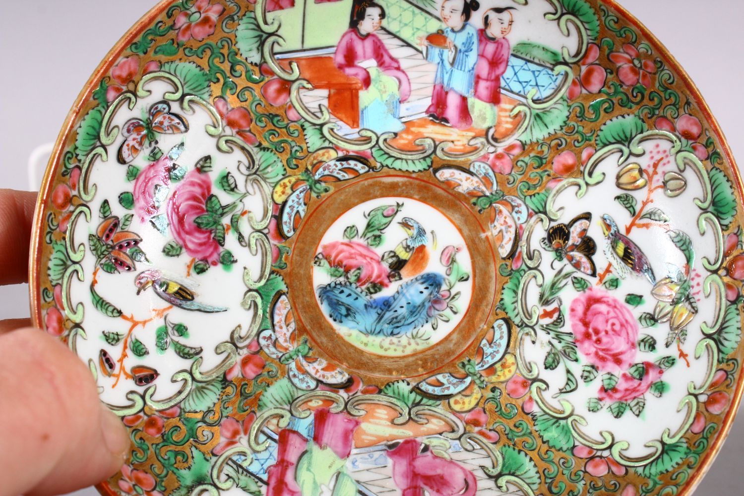 A 19TH CENTURY CHINESE FAMILLE ROSE CANTON CUPS & SAUCER, decorated with panels of birds and flora & - Image 4 of 5