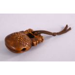 A JAPANESE MEJI PERIOD CARVED BOXWOOD NETSUKE OF MOKUGYO - DRAGON & BELL - carved with two dragons