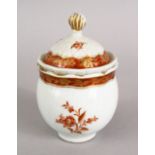A GOOD 18TH CENTURY CHINESE IRON RED & GILT DECORATED LIDDED POT, decorated with floral spray and
