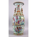 A LARGE 19TH CENTURY CHINESE FAMILLE ROSE CANTON PORCELAIN VASE, decorated with panels of figures in