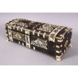A 19TH CENTURY ISLAMIC ANGLO INDIAN VIZAGAPATAM IVORY AND HORN LIDDED BOX, with carved ivory panels,