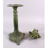 A UNUSUAL EARLY ISLAMIC POTTERY OIL LAMP ON STAND, 46cm high.