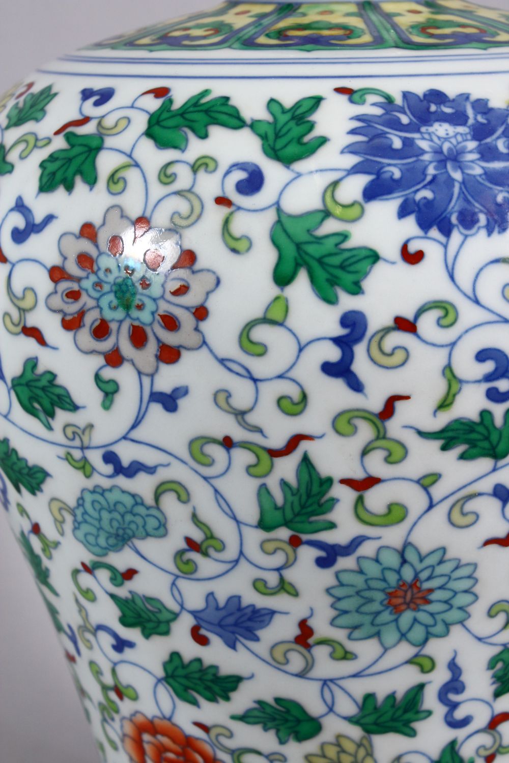 A CHINESE DOUCAI DECORATED PORCELAIN MEIPING VASE, decorated with formal scrolling lotus, and lappet - Image 2 of 9