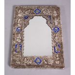 A GOOD 19TH CENTURY SILVER & ENAMEL MIRROR, with embossed decoration of seated figures, 22cm x 16cm