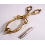 A 19TH CENTURY TURKISH SILVER PIPE & BRASS CHARCOAL TONGS, 8cm x 27cm.