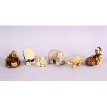 A COLLECTION OF LATER 19TH / 20TH CENTURY JAPANESE CARVED IVORY NETSUKE, one of a rhino, a seated