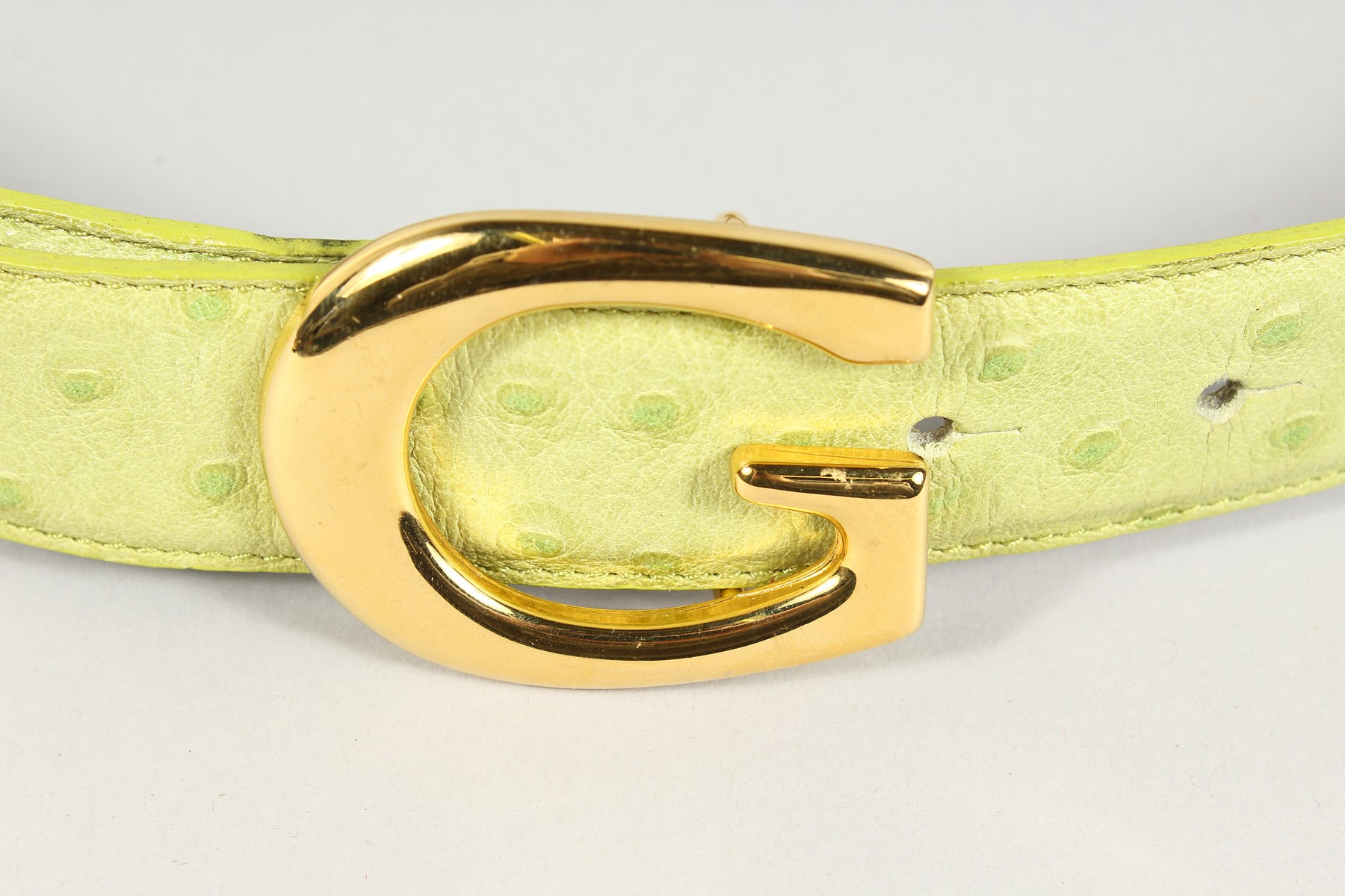 A GREEN LEATHER AND GILT BELT. 26ins long. - Image 2 of 4