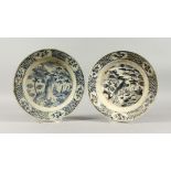 TWO CHINESE WANLI PERIOD BLUE AND WHITE PEACOCK PATTERN SHIPWRECK PLATES. 10ins diameter.