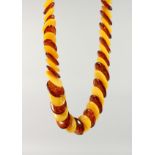 A TWO-COLOUR FAUX-AMBER NECKLACE.