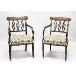 A GOOD PAIR OF REGENCY MAHOGANY ARMCHAIRS, with triple pierced oval splats, reeded arms, padded