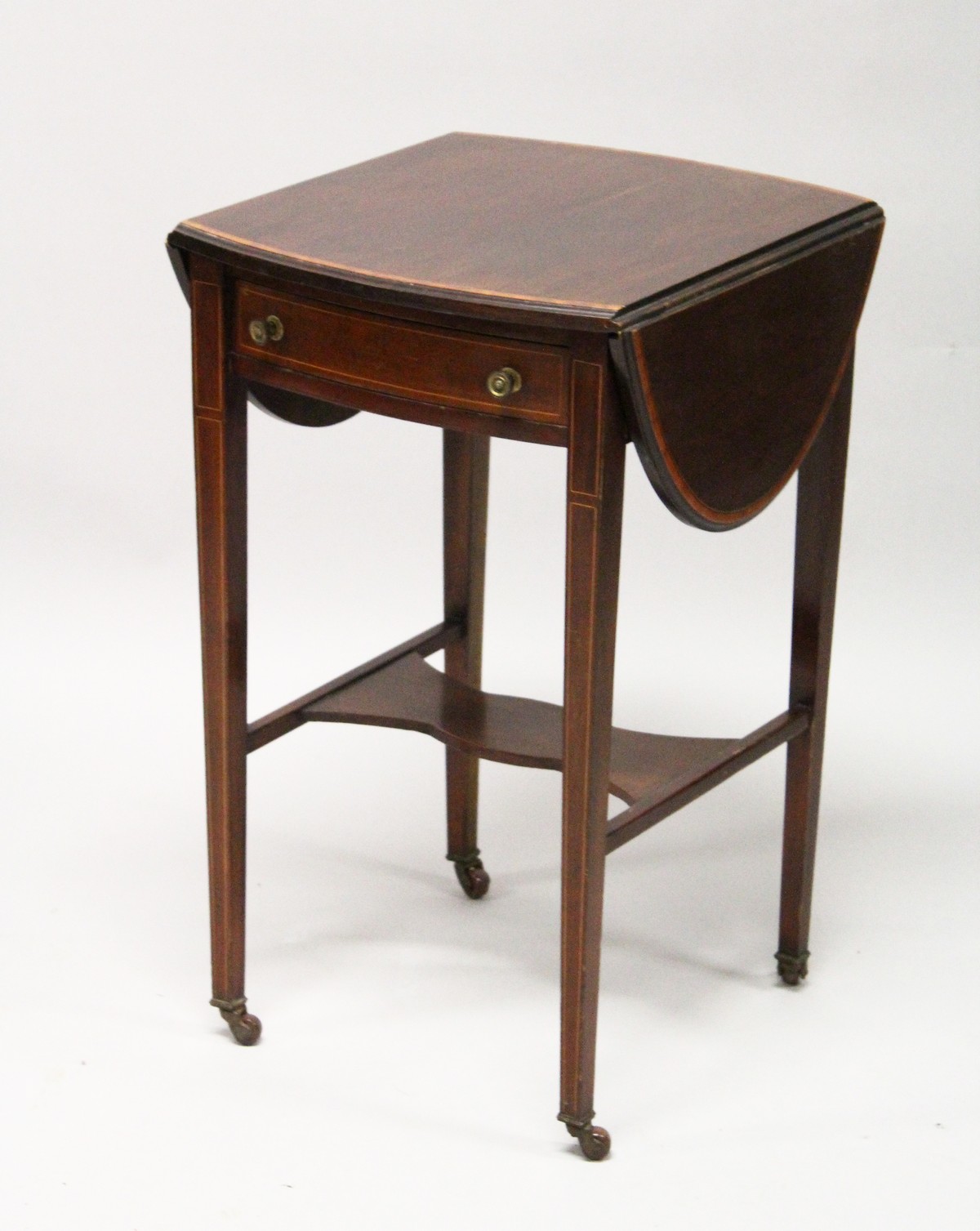 AN EDWARDIAN MAHOGANY AND SATINWOOD BANDED SMALL DROP LEAF TABLE, with a drawer to one end, tapering