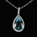 A SUPERB 18CT WHITE GOLD, AQUAMARINE AND DIAMOND PENDANT on a chain.