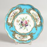 A GOOD SEVRES SHAPED PORCELAIN TAZZA, blue and gilt borders, painted with vignettes of birds and