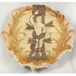 A CIRCULAR SILKWORK PICTURE, depicting Eve (?), mounted onto glass. Silkwork: 18ins diameter.