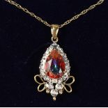 A LOVELY 9CT GOLD, AZOTIC TOPAZ AND DIAMOND PENDANT on a chain.