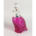 A SILVER PLATED CRANBERRY PARROT CLARET JUG. 9.5ins high.