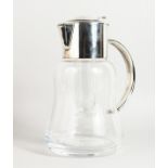 A GOOD LARGE LEMONADE JUG with plated handle and lid. 11ins high.