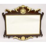 A GOOD GEORGE III DESIGN MAHOGANY FRETWORK FRAME WALL MIRROR, with pierced, carved and gilded frame.