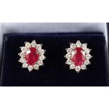 A PAIR OF 18CT WHITE GOLD, RUBY AND DIAMOND EARRINGS of 2.3cts.