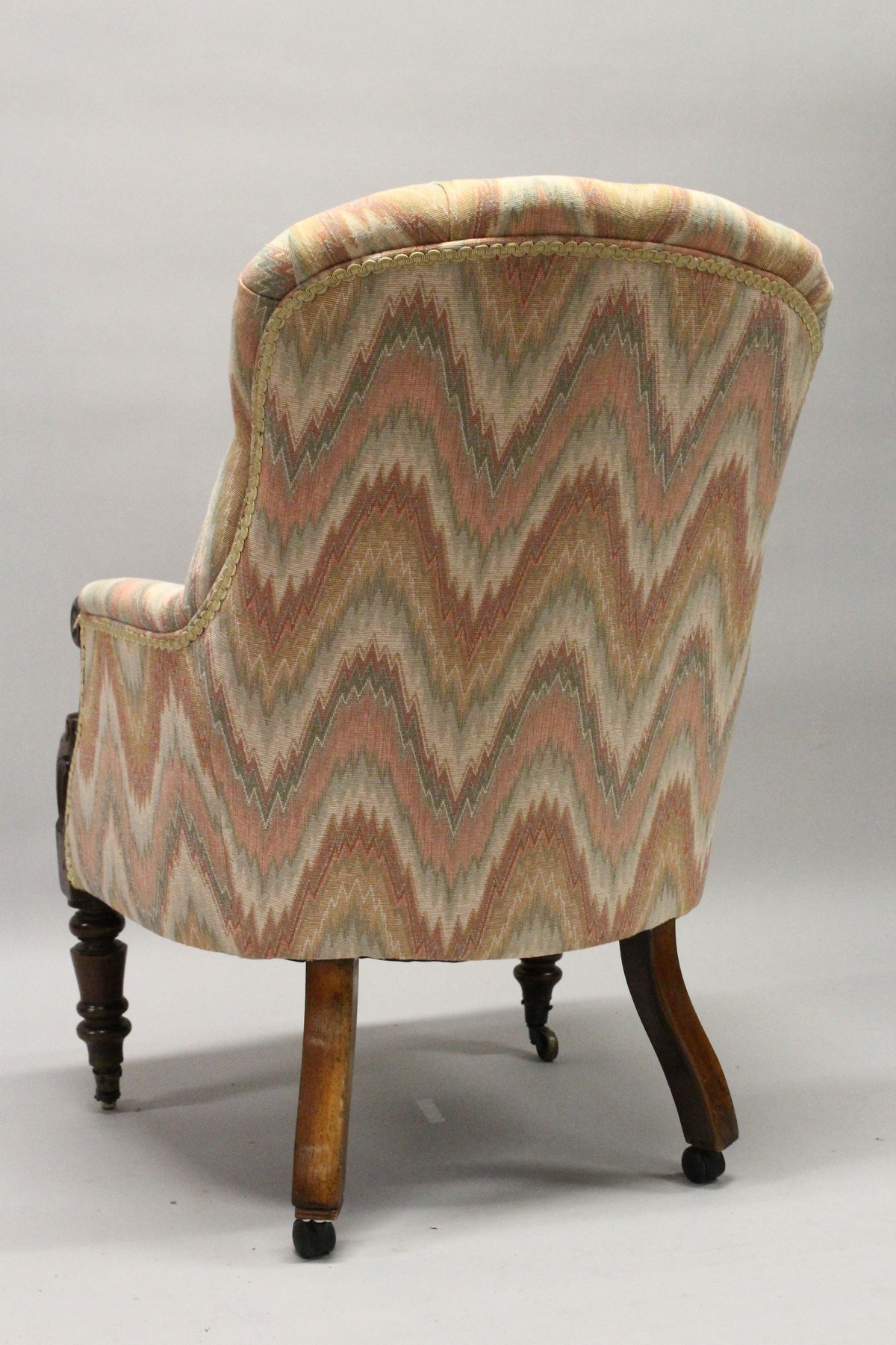 A 19TH CENTURY MAHOGANY FRAMED BUTTON UPHOLSTERED ARMCHAIR, with carved "C Scroll" arm caps, - Image 5 of 10