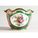 A SUPERB PARIS PORCELAIN CACHE POT painted with birds in a landscape under a pink and dark green