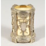 A SMALL FRENCH SILVER AND IVORY VASE with pierced decoration. 2.25ins high.